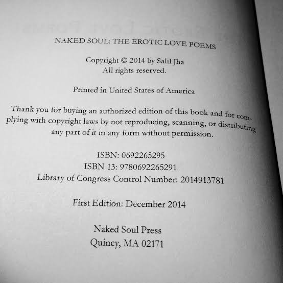 Checking a book’s copyright page for publisher, copyright owner, and edition information.