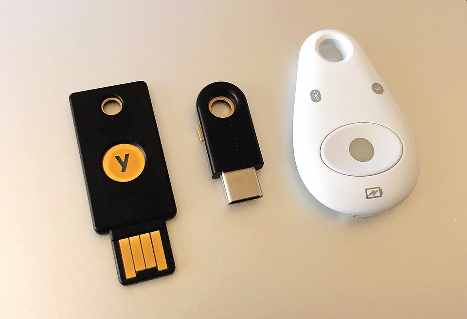 USB and NFC security keys used for multi-factor authentication on digital asset accounts.